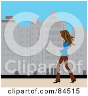 Casual Brunette Caucasian Woman Walking On A City Sidewalk During The Day