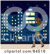 Poster, Art Print Of Casual Brunette Caucasian Woman Walking On A City Sidewalk At Night