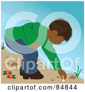 Poster, Art Print Of Indian Boy On A Beach Bending Over To Pick Up A Shell