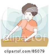 Little Girl Using A Measuring Tape On A Table