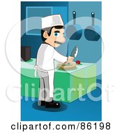Male Chef Looking Back While Chopping Veggies On A Cutting Board