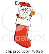 Tooth Mascot Cartoon Character Wearing A Santa Hat Inside A Red Christmas Stocking by Mascot Junction
