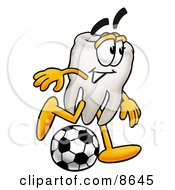 Tooth Mascot Cartoon Character Kicking A Soccer Ball