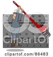 Worker Man Hanging From A Monkey Wrench While Tightening A Wall Of Nuts