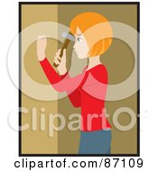 Red Haired Caucasian Woman Hammering A Nail Into Her Tan Wall While Decorating