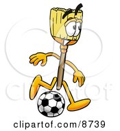 Broom Mascot Cartoon Character Kicking A Soccer Ball by Mascot Junction