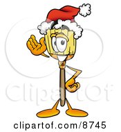 Broom Mascot Cartoon Character Wearing A Santa Hat And Waving