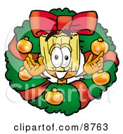 Broom Mascot Cartoon Character In The Center Of A Christmas Wreath