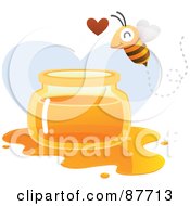 Happy Bee Flying Over A Spilled Jar Of Honey