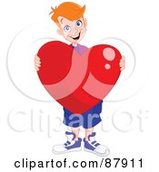 Sweet Red Haired Teen Boy Holding A Giant Red Heart