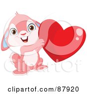 Poster, Art Print Of Cute Pink Bunny Rabbit Holding Up A Shiny Red Heart