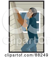 Black Man Climbing A Ladder On The Side Of A House