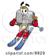 Camera Mascot Cartoon Character Skiing Downhill