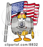Camera Mascot Cartoon Character Pledging Allegiance To An American Flag