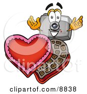 Camera Mascot Cartoon Character With An Open Box Of Valentines Day Chocolate Candies