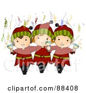 Three Christmas Elves With Champagne And Confetti