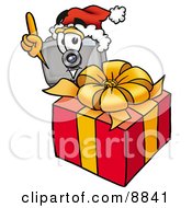 Poster, Art Print Of Camera Mascot Cartoon Character Standing By A Christmas Present