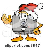 Camera Mascot Cartoon Character Wearing A Santa Hat And Waving