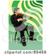 Male Violinist Playing In A Chair