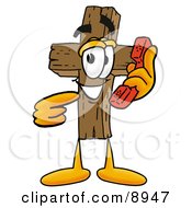 Wooden Cross Mascot Cartoon Character Holding A Telephone