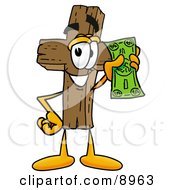 Wooden Cross Mascot Cartoon Character Holding A Dollar Bill