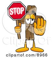 Wooden Cross Mascot Cartoon Character Holding A Stop Sign