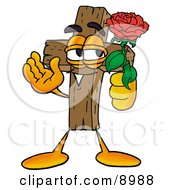 Wooden Cross Mascot Cartoon Character Holding A Red Rose On Valentines Day