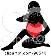 Black Female Silhouette Holding A Red Heart