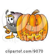 Eight Ball Mascot Cartoon Character With A Carved Halloween Pumpkin