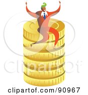 Successful Businessman Sitting On Gold Coins