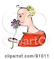 Blond Woman Smelling A Purple Flower