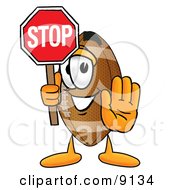 Football Mascot Cartoon Character Holding A Stop Sign