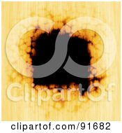 Royalty Free RF Clipart Illustration Of A Burnt Black Hole In Orange Paper