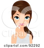 Royalty Free RF Clipart Illustration Of A Brunette Caucasian Woman Applying Pink Lipstick by Melisende Vector