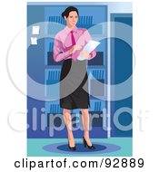 Business Woman Standing By A Book Shelf
