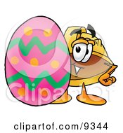 Hard Hat Mascot Cartoon Character Standing Beside An Easter Egg
