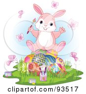 Royalty Free RF Clipart Illustration Of An Adorable Easter Bunny With A Paintbrush And Butterflies Sitting On Eggs