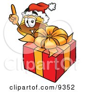 Poster, Art Print Of Hard Hat Mascot Cartoon Character Standing By A Christmas Present