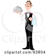 Professional Butler Standing Tall And Holding A Platter And Towel