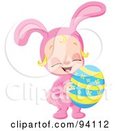 Poster, Art Print Of Little Girl In A Pink Bunny Costume Holding An Easter Egg
