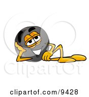 Hockey Puck Mascot Cartoon Character Resting His Head On His Hand