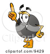 Hockey Puck Mascot Cartoon Character Pointing Upwards