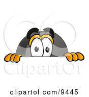 Hockey Puck Mascot Cartoon Character Peeking Over A Surface