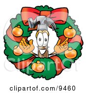 Clipart Picture Of A Hammer Mascot Cartoon Character In The Center Of A Christmas Wreath