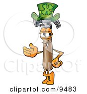 Clipart Picture Of A Hammer Mascot Cartoon Character Wearing A Saint Patricks Day Hat With A Clover On It