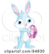 Royalty Free RF Clipart Illustration Of A Blue And White Boy Easter Bunny Carrying An Egg