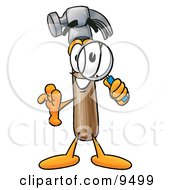 Clipart Picture Of A Hammer Mascot Cartoon Character Looking Through A Magnifying Glass by Toons4Biz