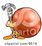 Clipart Picture Of A Hammer Mascot Cartoon Character Standing With A Christmas Bauble by Toons4Biz