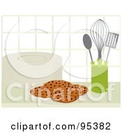 Poster, Art Print Of Plate Of Fresh Chocolate Chip Cookies By Utensils On A Kitchen Counter