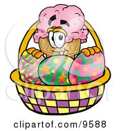 Ice Cream Cone Mascot Cartoon Character In An Easter Basket Full Of Decorated Easter Eggs